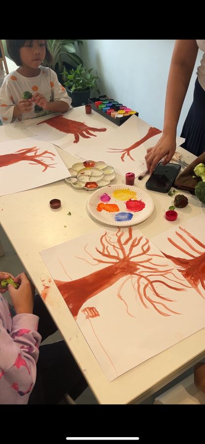 Students painting at Master Artist