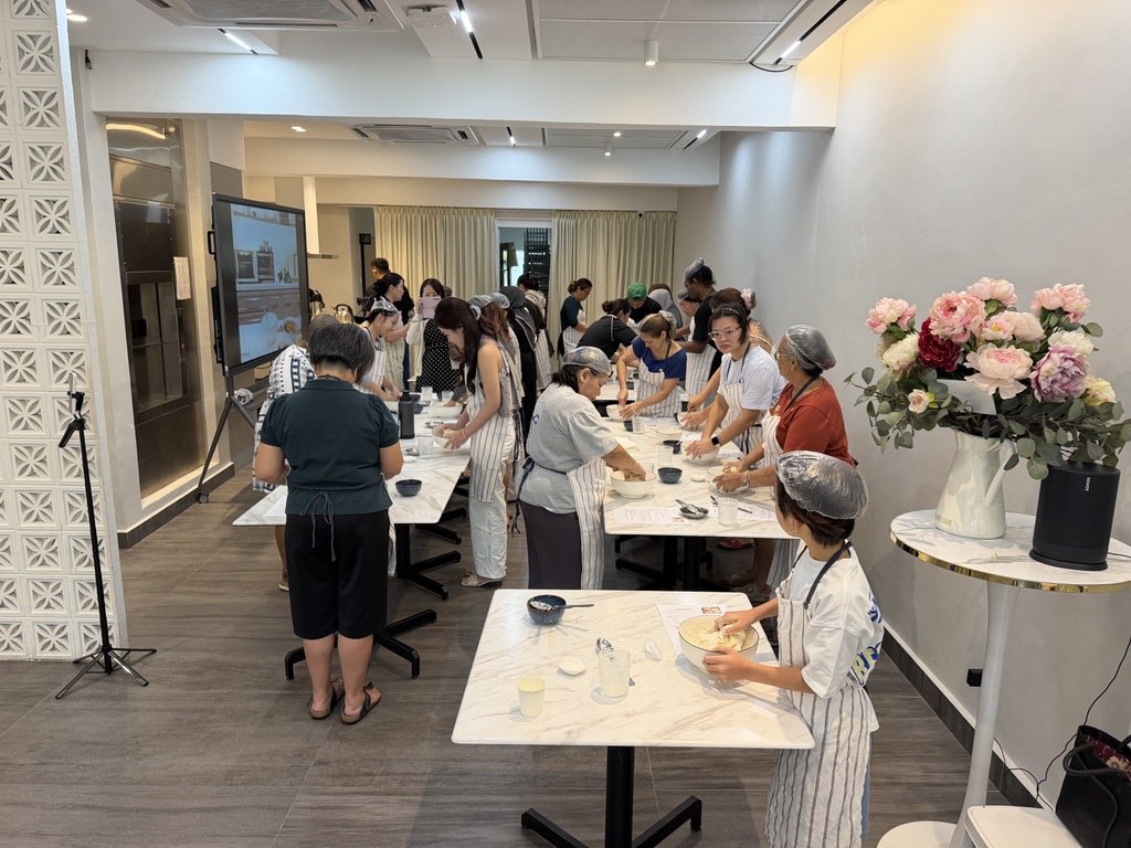 Bakers of all ages at a Master Artist focaccia workshop