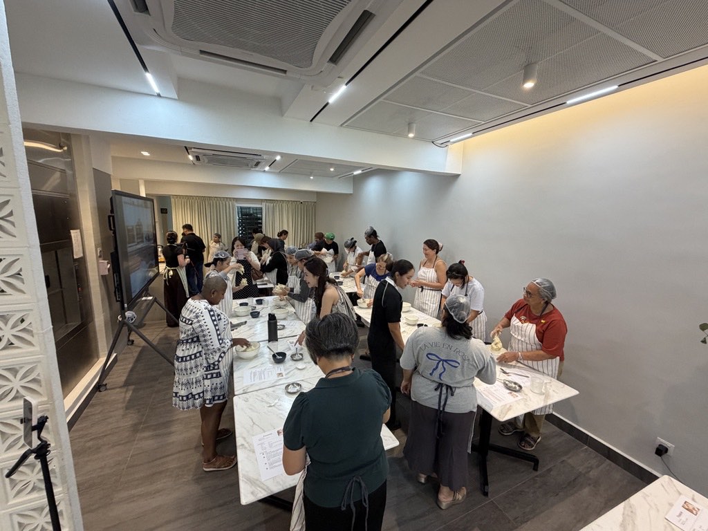 Mixing focaccia dough at a workshop