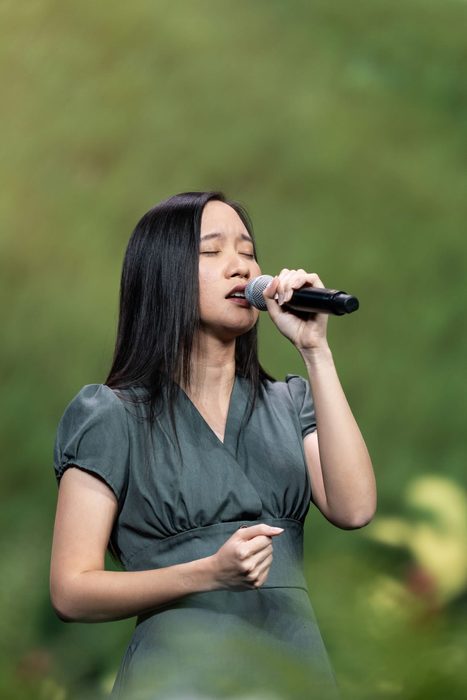 Sabrina Hew performing as a vocalist